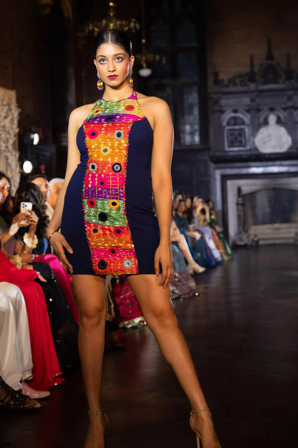 Navy halter neck mini dress with vibrant multicolor bandhej and mirror embroidery.