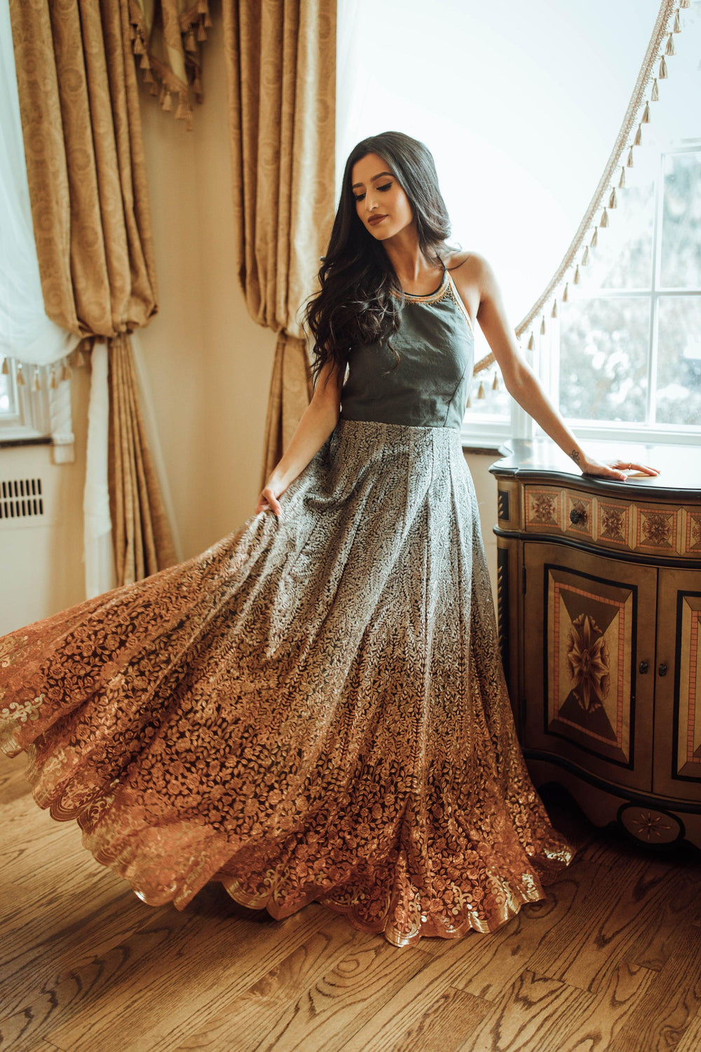 Ombre embroidered net and silk gown with heavy sequins and resham work, sleeveless, open back.