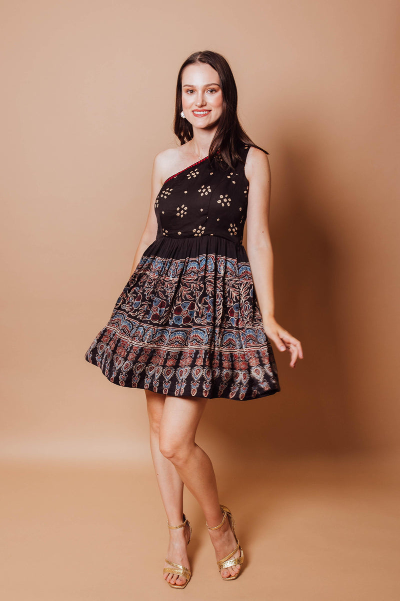 Olivia Black One-Shoulder Dress with Ajrakh print, hand-bandhej, and mirror embroidery.