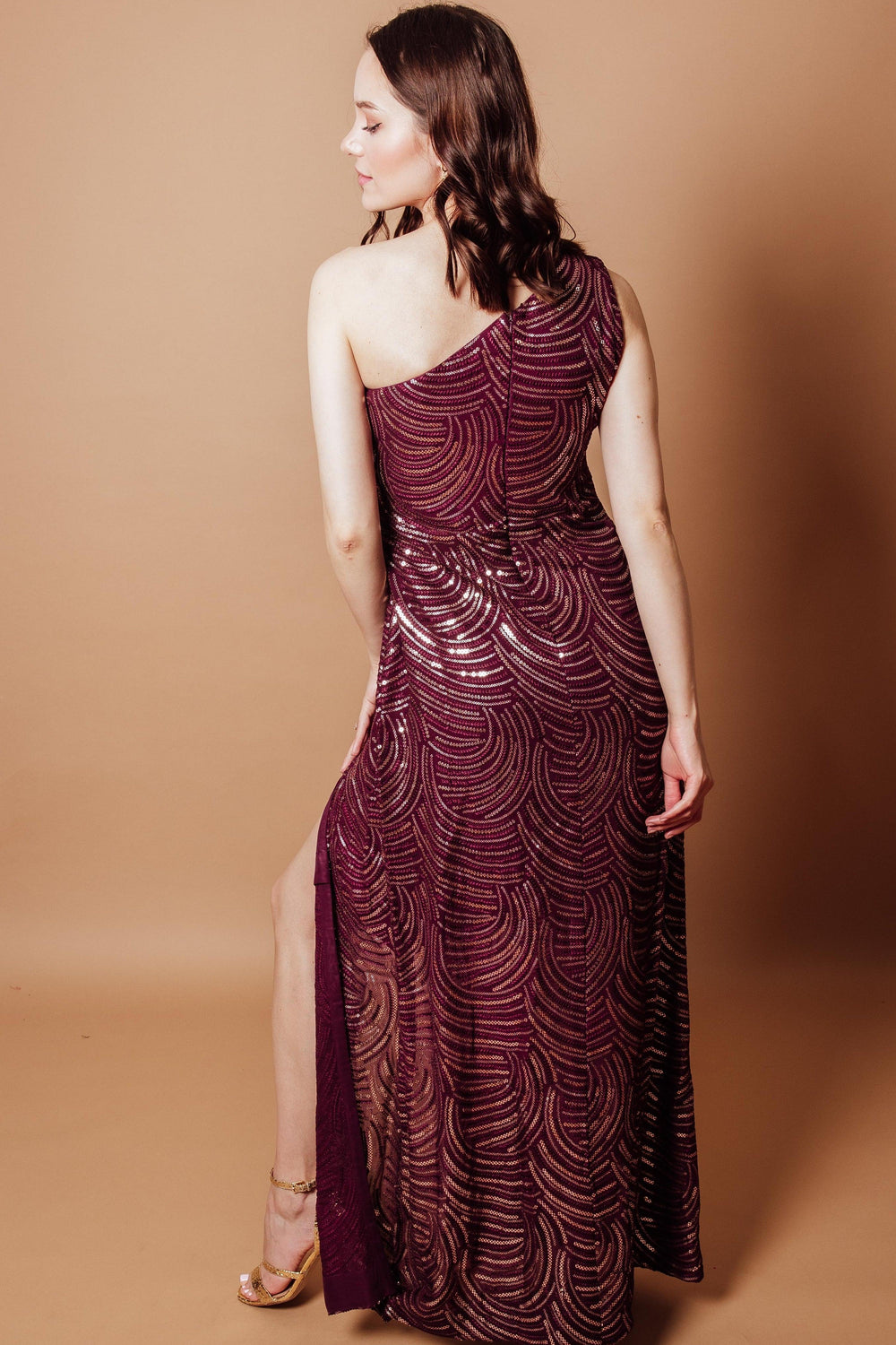 Wine georgette one-shoulder maxi dress with all-over sequin embroidery and a left-leg slit.