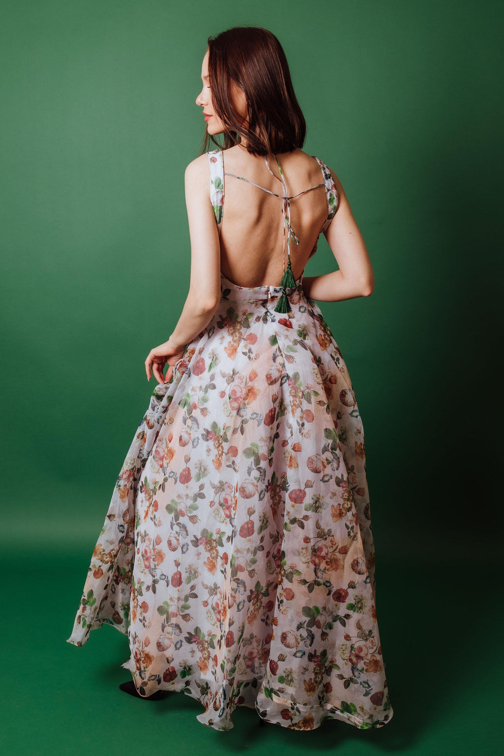 Oranga Floral Printed Gown: White organza gown with peach, coral, sage floral print, open back, and full skirt.