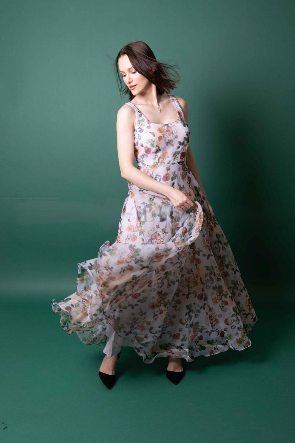 Oranga Floral Printed Gown: White organza gown with watercolor roses, fitted bodice, and full skirt.