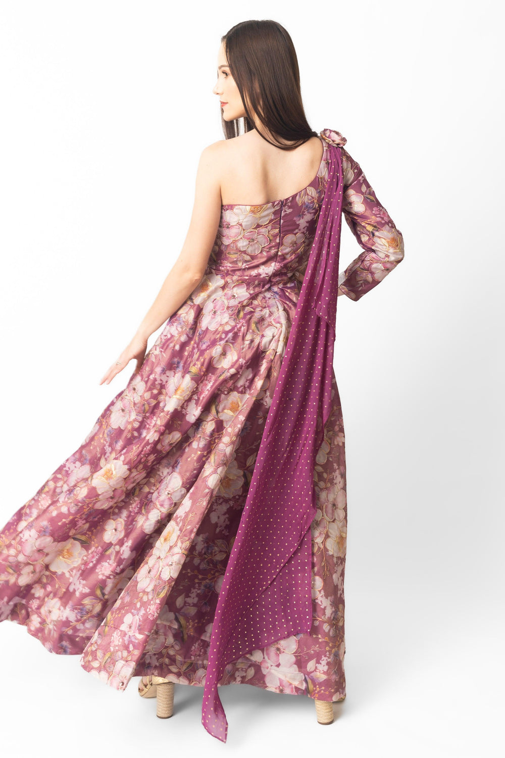 Wine organza one-shoulder gown with all-over floral embroidery and a flowing silhouette.