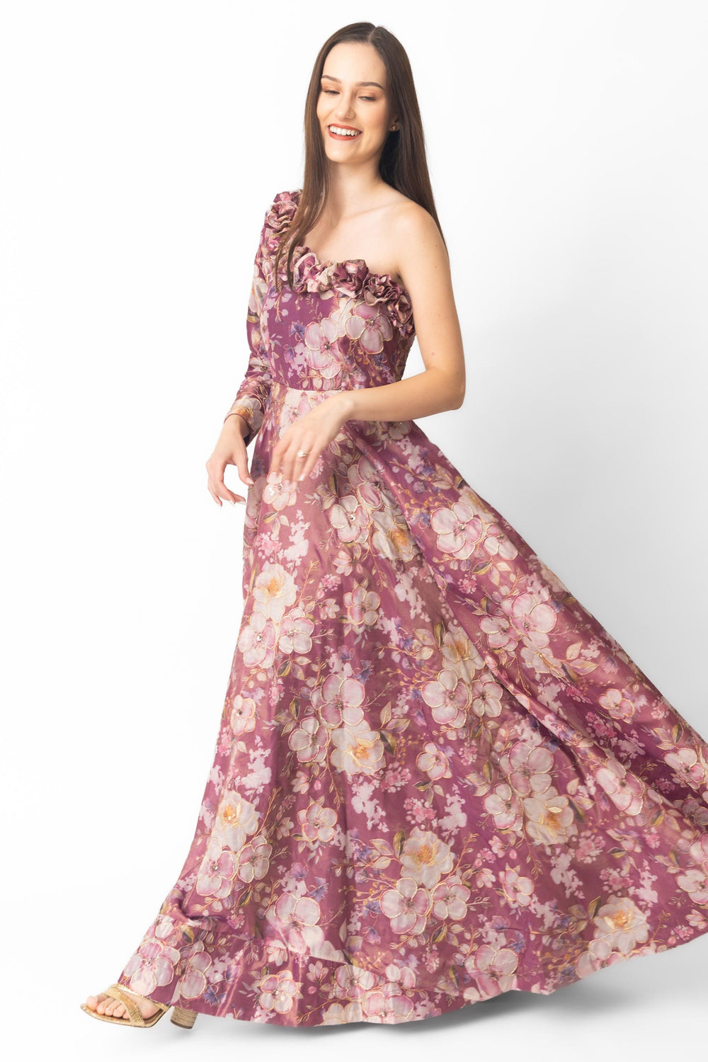 Pink floral organza one-shoulder gown with 3D flowers on the neckline, flowing skirt.