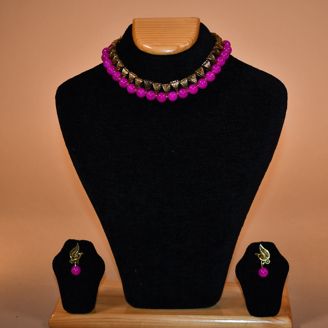 Pink Necklace with Intricate Earrings