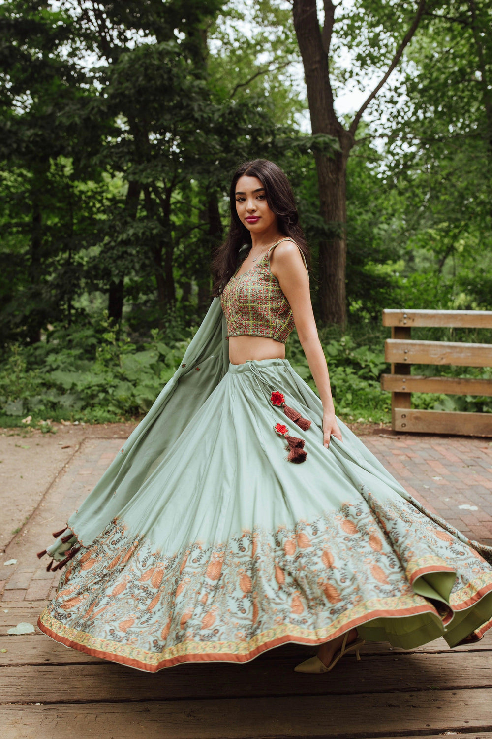 Pista green lehenga with embroidered choli and dupatta, front view, wedding wear