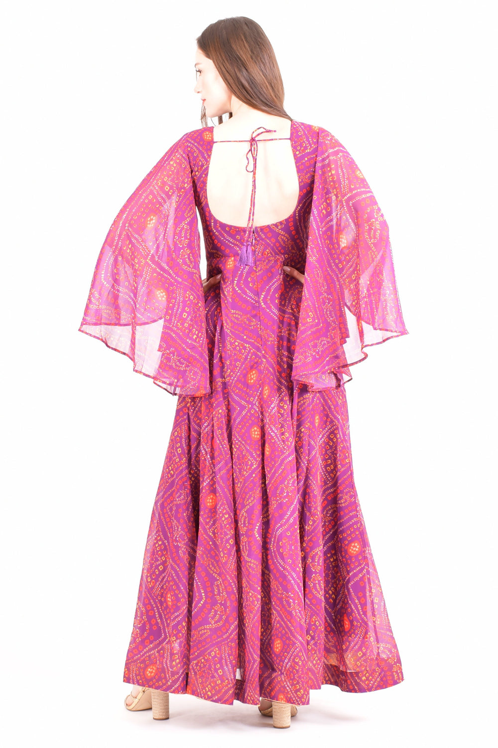 Purple georgette maxi dress with bell sleeves, Kutchi embroidery, and an open back with tie detail.