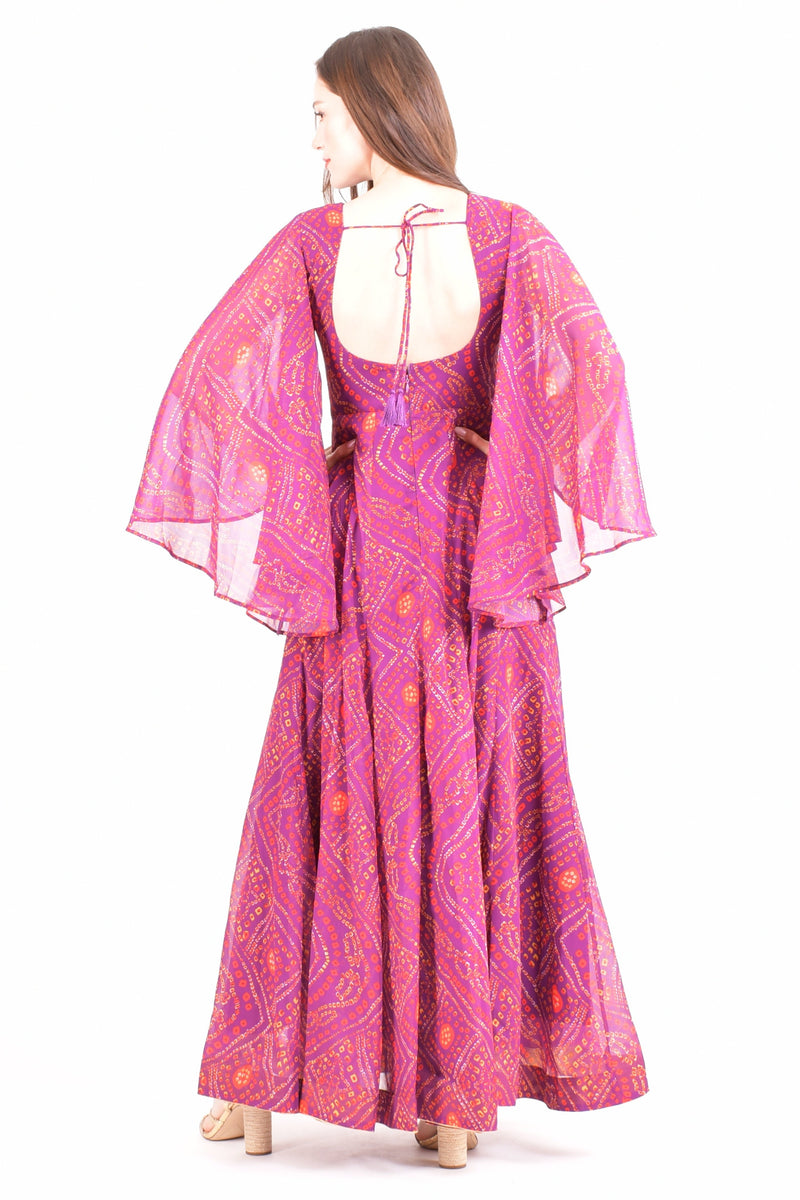Purple georgette maxi dress with bell sleeves, Kutchi embroidery, and an open back with tie detail.