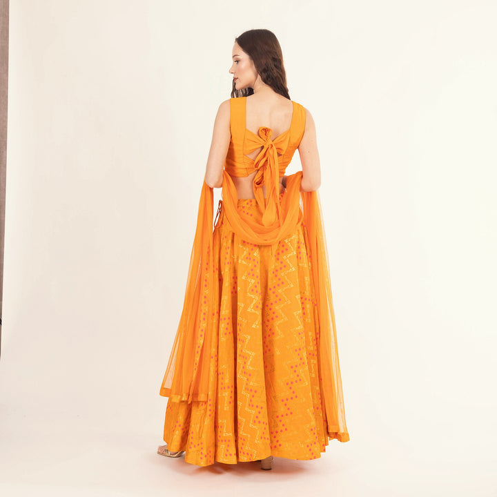 Aliza Yellow Lehenga with Silk Sleeveless Blouse