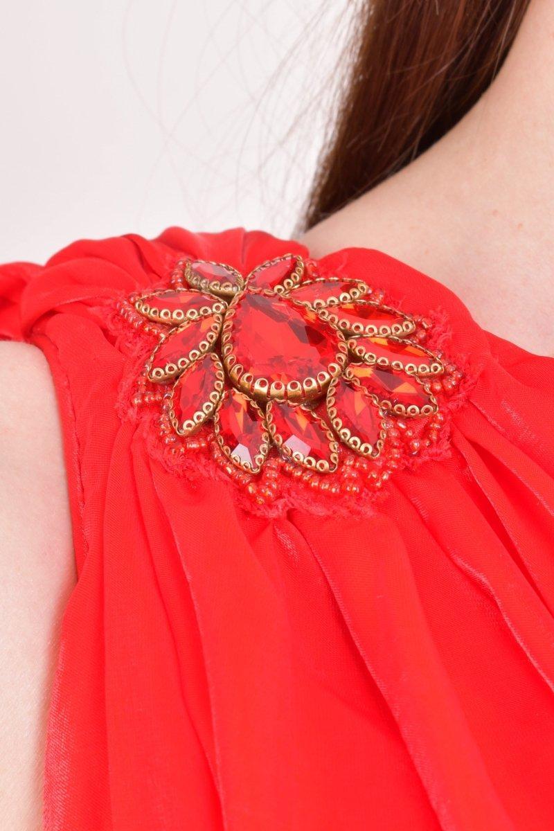 Red silk maxi dress with a rhinestone-embellished one-shoulder strap and delicate stone details.