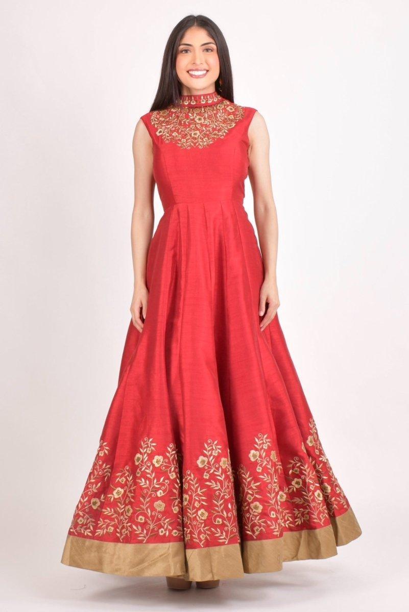 Red raw silk maxi gown with high neck and intricate gold floral embroidery.