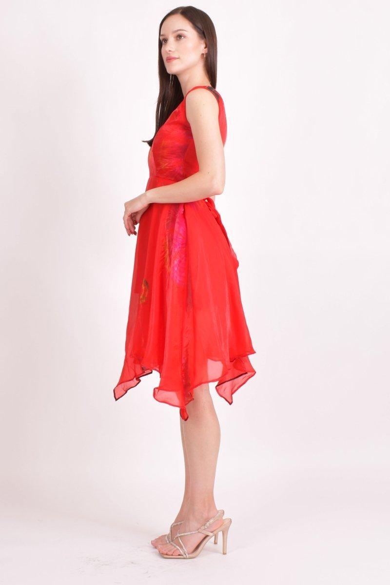 Red hand tie-dye high-low dress with flowing silk fabric and contrasting patterns.
