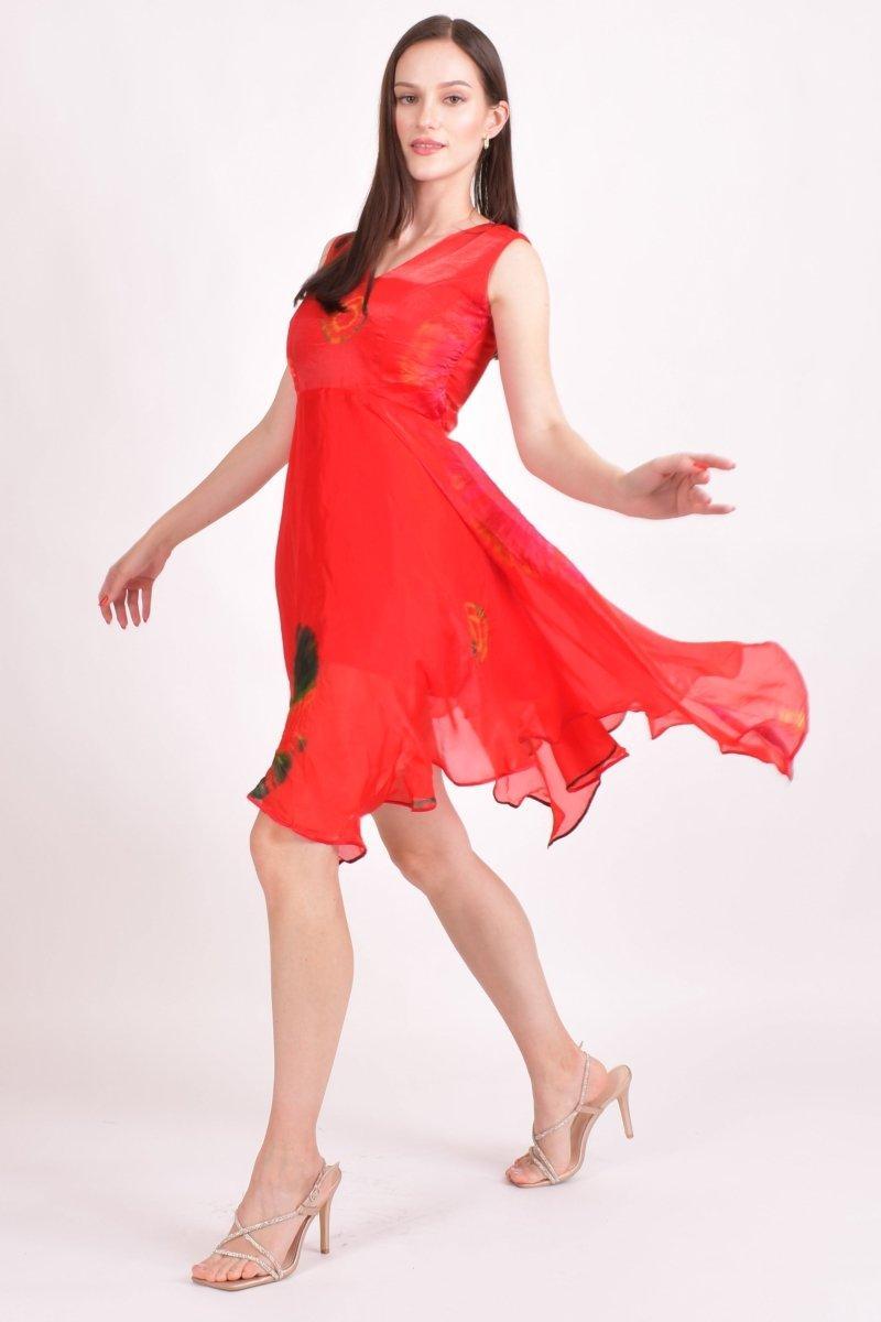 Red silk hand tie-dye high-low dress with flowing hem, worn by a model.