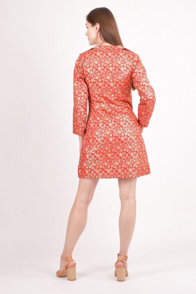 Red silk jacquard mini blazer dress with gold floral brocade pattern, long sleeves, and structured silhouette.