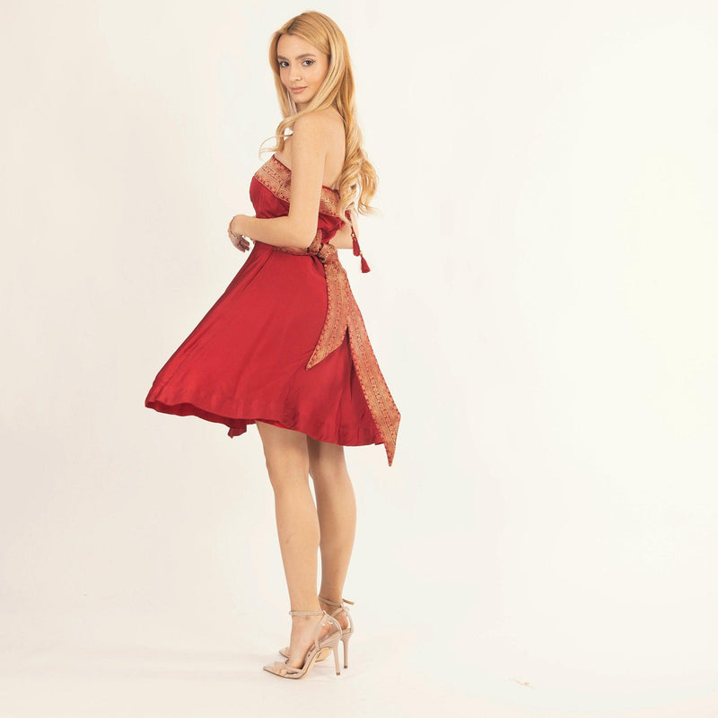 Red silk strapless mini dress with jacquard weaving border and back tie detail.