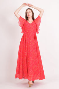 Red georgette maxi dress with all-over bandhani print and soft butterfly sleeves.