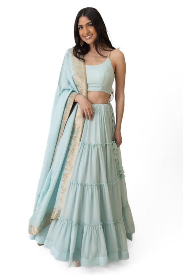 Sky Blue Shimmer Tiered Lehenga Choli with Gold Accents for Women-[mehendi outfit]-Raas