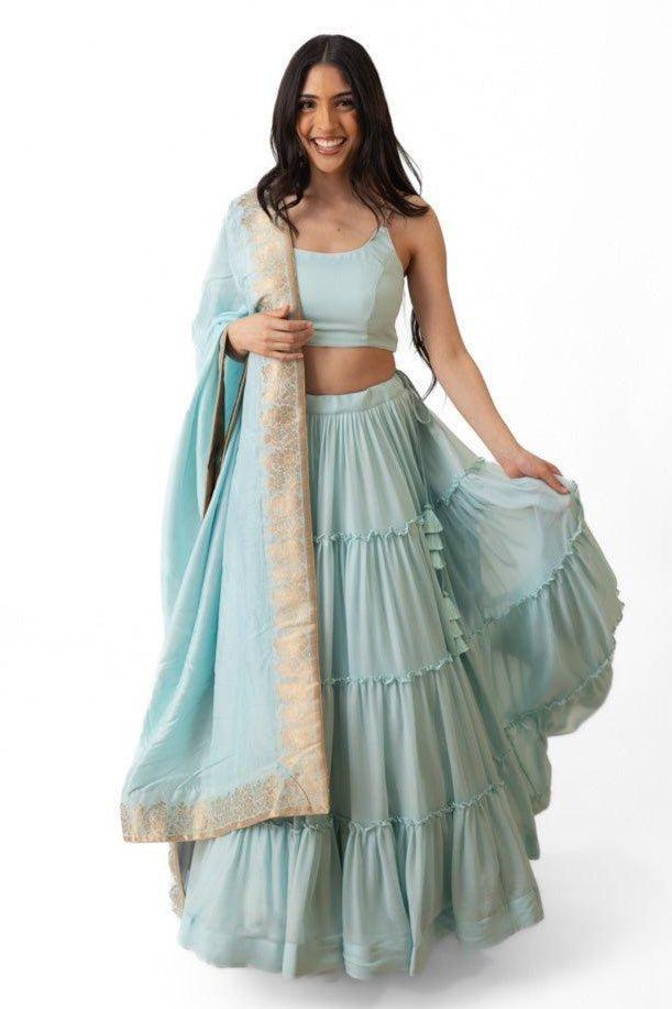 Sky Blue Shimmer Tiered Lehenga Choli with Gold Accents for Women-[mehendi outfit]-Raas