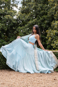 Sky Blue Shimmer Tiered Lehenga Choli with Gold Accents for Women-[mehendi outfit]-Raas