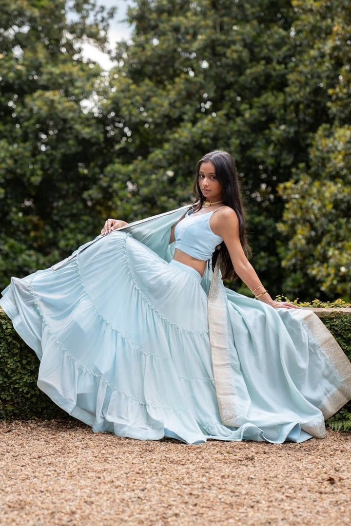 Sky Blue Shimmer Tiered Lehenga Choli with Gold Accents for Women-[mehendi outfit]-Raas