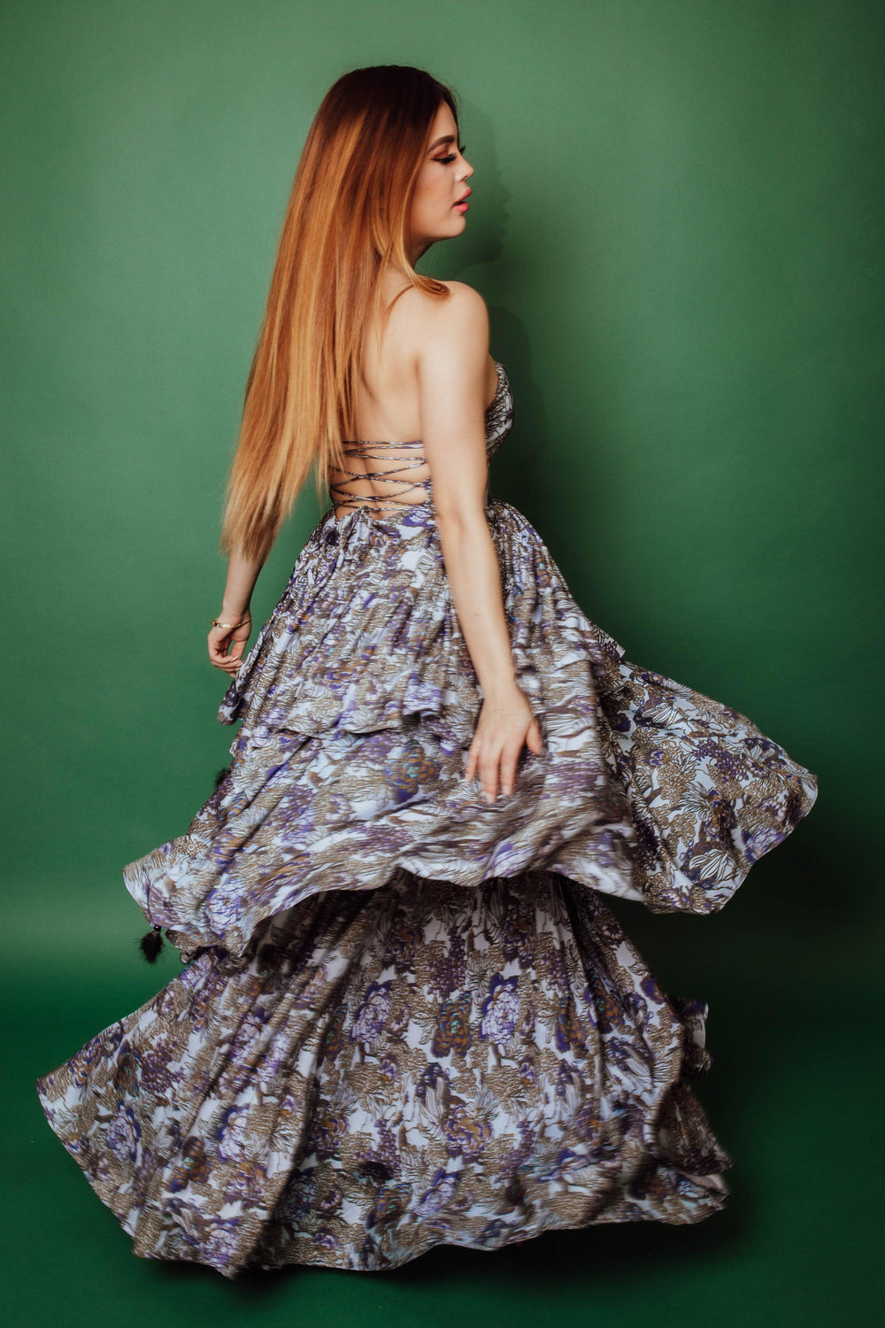 Nemira Tiered Floral Convertible Long Dress in luxurious silk, featuring three tiers of micro-pleating and a strapless design.