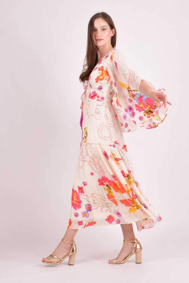 White floral ruffle chiffon maxi dress with angel sleeves and watercolor prints.