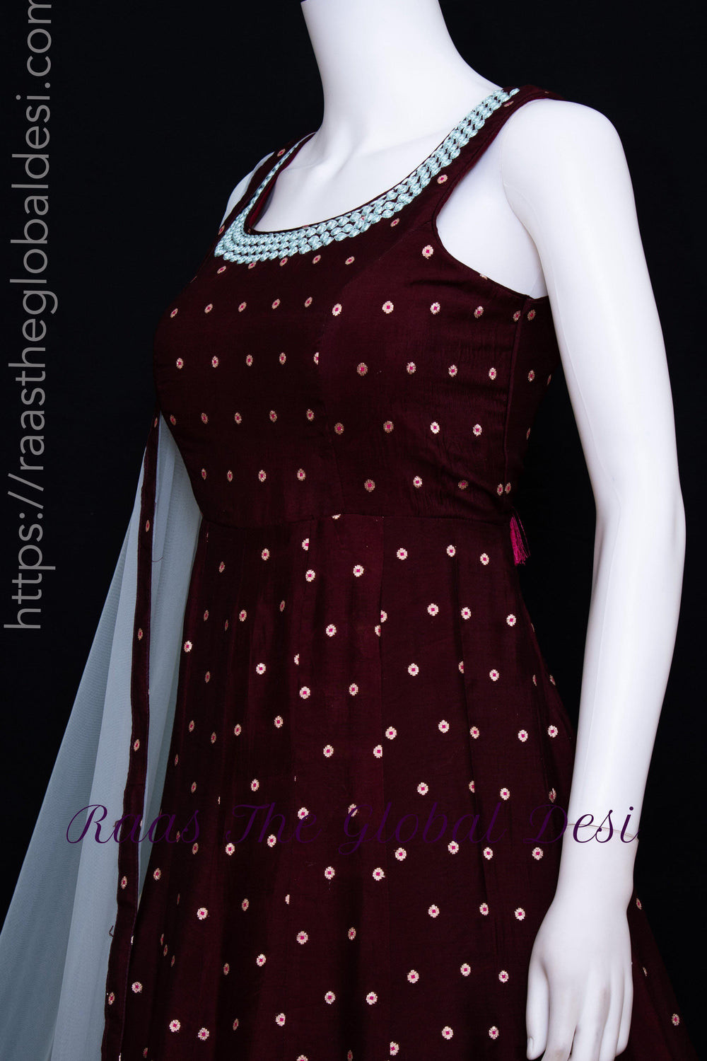 Wine silk long dress with a-line silhouette, resham & mirror embroidery, and light blue net drape.
