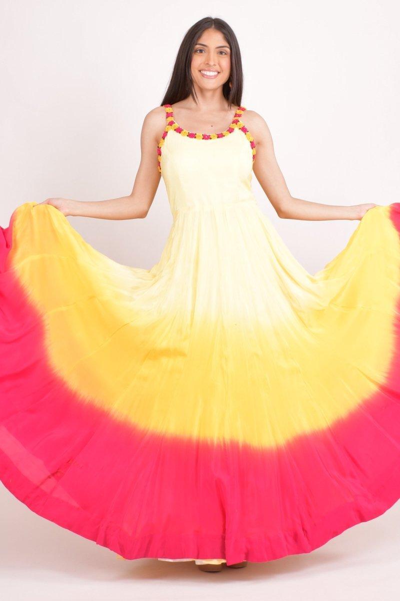 Yellow and pink hand tie-dye ombre silk maxi sundress with embroidered neckline.