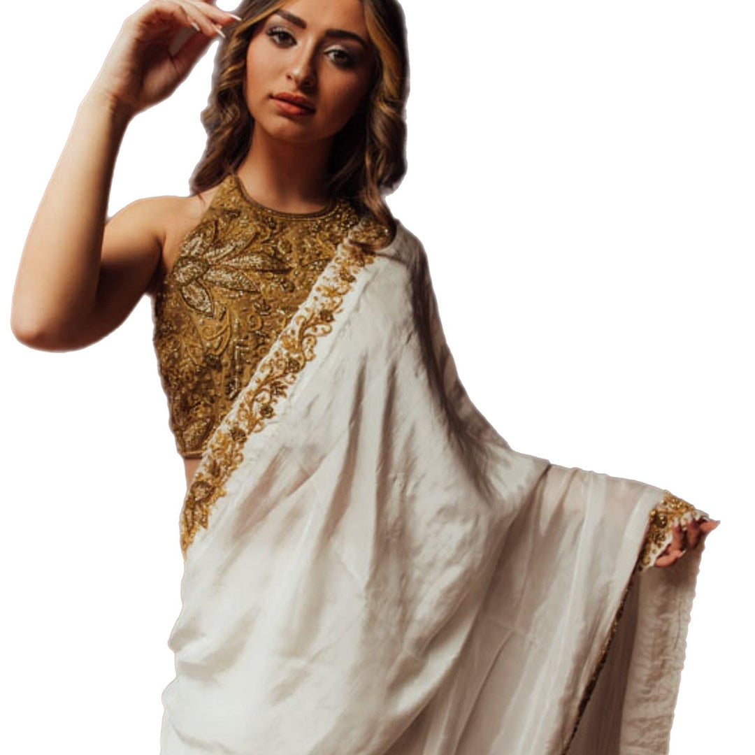 Off white silk saree with hand embroidered blouse - Raas