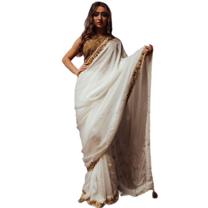 Off white silk saree with hand embroidered blouse - Raas