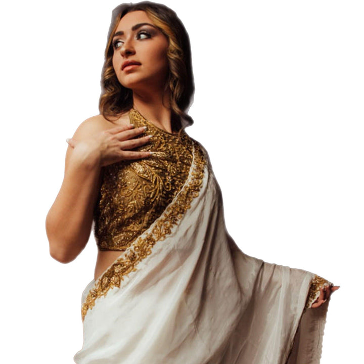 Off white silk saree with hand embroidered blouse - Raas