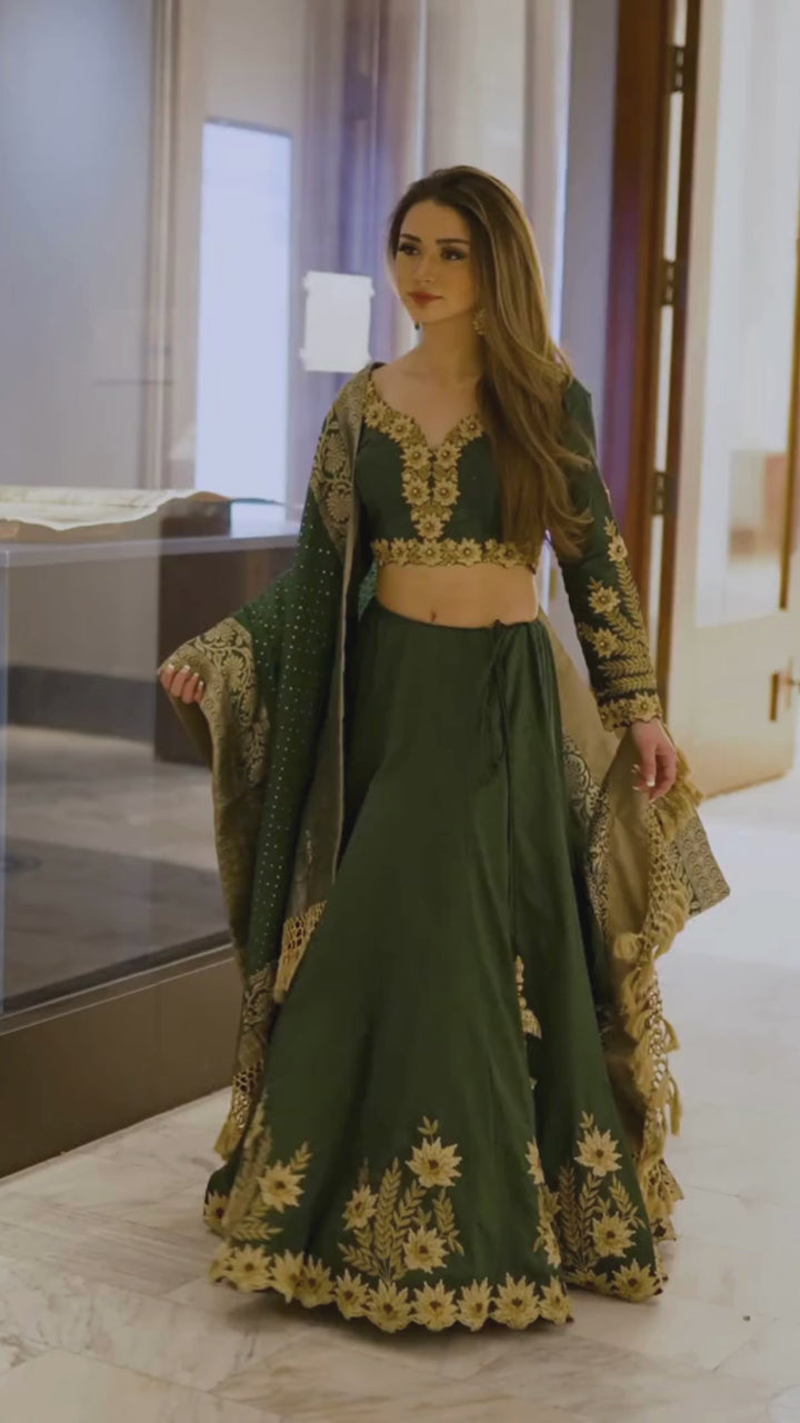 Andi Green Silk Lehenga Choli with Heavy Embroidery