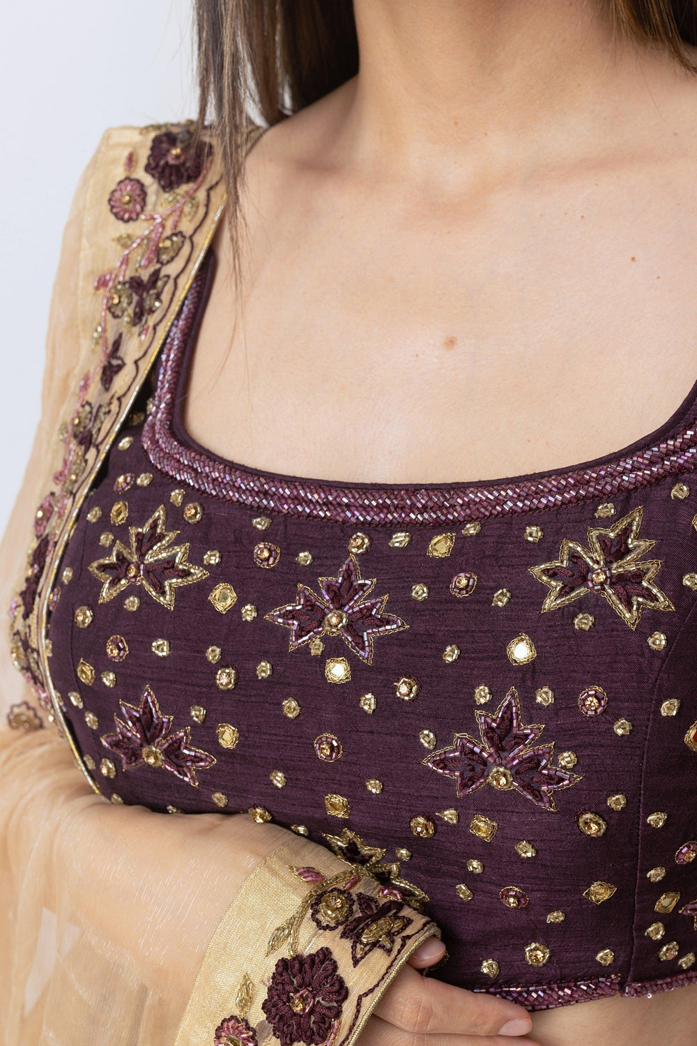 Wine bridal lehenga with sleeveless open-back blouse and string tie