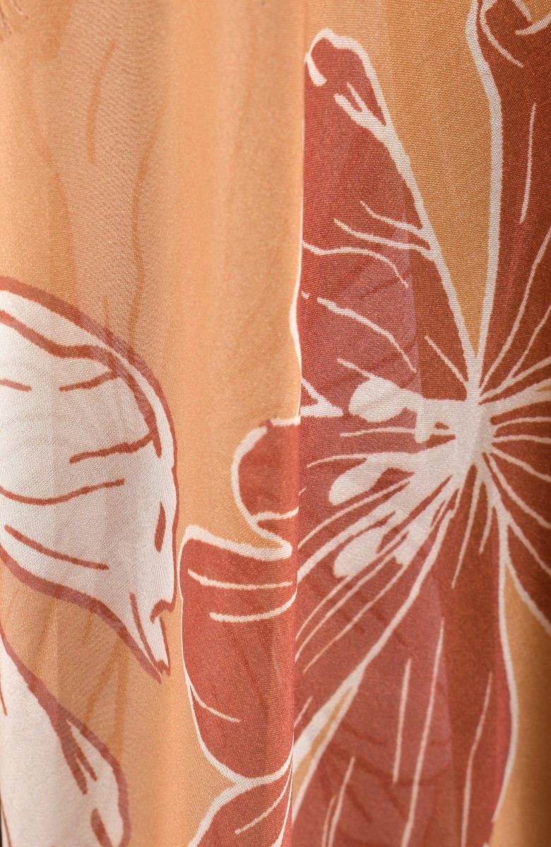 Close-up of the yellow, rust and ivory floral print on the lehenga skirt
