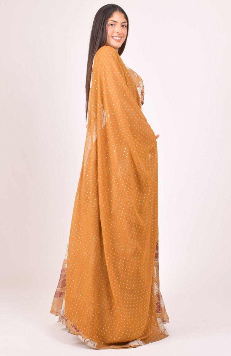 Side view showing the dotted dupatta with the yellow floral lehenga choli