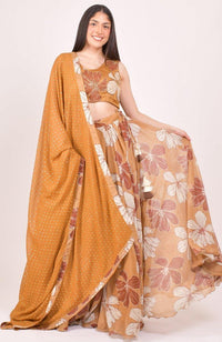 Model wearing a yellow floral Zardoshi and stone embroidered lehenga choli with matching dupatta