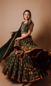 Green rayon tiered lehenga choli set with hand embroidery, full flare, and dupatta, perfect for Garba.