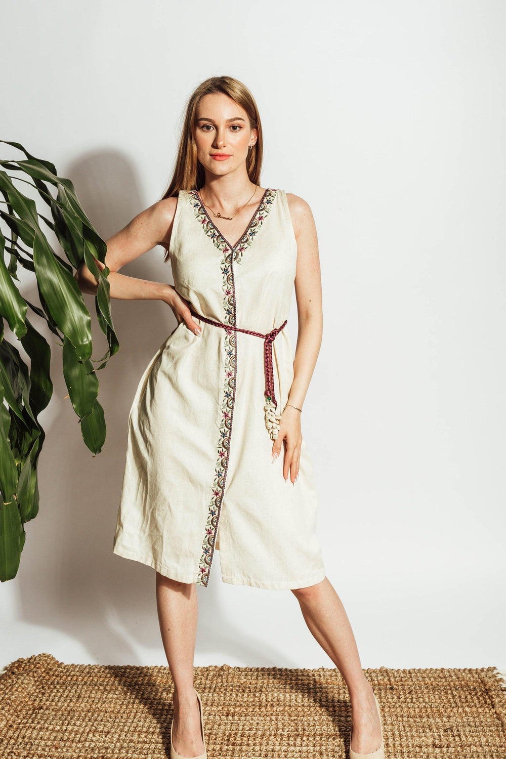 Off-white flex cotton midi dress with thread embroidery, sleeveless, and a maroon resham embroidered belt.