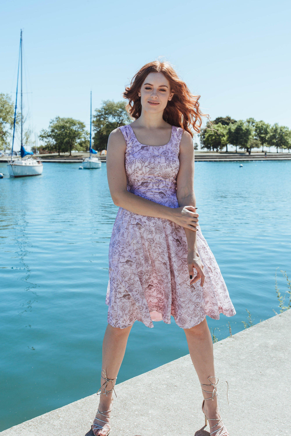 Pink mul cotton midi dress with all-over thread embroidery, sleeveless design, and a flattering silhouette.