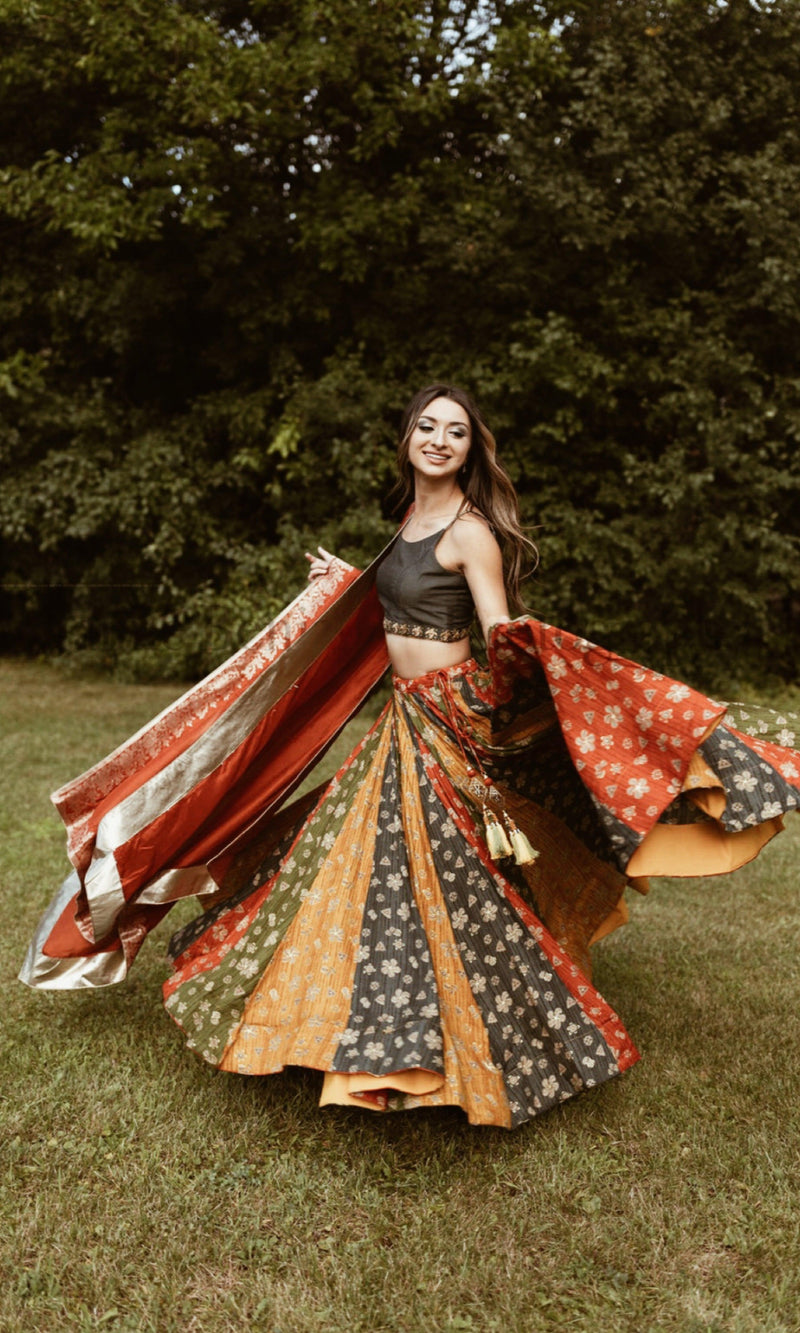Zelie silk print lehenga choli with multicolor flare, embroidered blouse, and dupatta in a dramatic twirl.